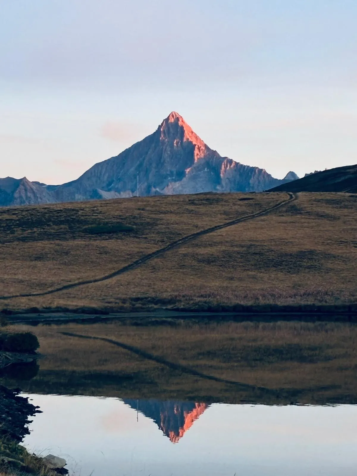 Mountain peak reflected in an alpine lake